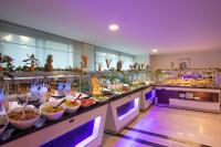 a buffet line with many different types of food at Palmin Hotel in Kusadası
