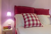 La Porta Rossa di Borgo - Vatican Luxury Suiteにあるベッド