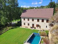 an aerial view of a house with a swimming pool at Chalupa Zátyní - celý objekt in Dubá