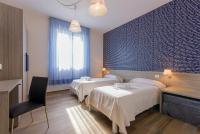 A bed or beds in a room at Zacapa B&B