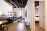 A bed or beds in a room at Valencia Luxury - Boutique Redonda