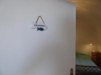 A bed or beds in a room at Torrione San Giovanni II