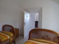 A bed or beds in a room at Torrione San Giovanni II