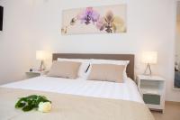 Postel nebo postele na pokoji v ubytování Summer Lounge Apartments