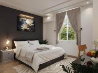 Un dormitorio con una gran cama blanca y una ventana. en Luxury Hotel Saigon, en Ho Chi Minh