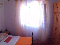 Postel nebo postele na pokoji v ubytování Apartments Ivana i Darko