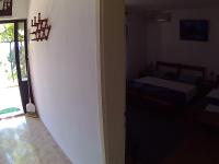 Postel nebo postele na pokoji v ubytování Apartments Ivana i Darko