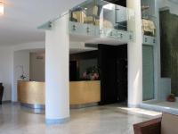 El vestíbulo o zona de recepción de Hotel Villa Carolina