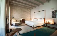 A bed or beds in a room at Mercer Hotel Barcelona