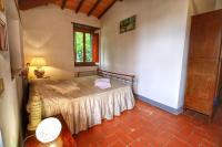 Postel nebo postele na pokoji v ubytování Casa Vacanza Le Corniole