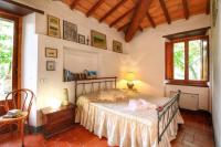 Postel nebo postele na pokoji v ubytování Casa Vacanza Le Corniole