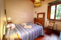 Postel nebo postele na pokoji v ubytování Casa Vacanza Le Corniole