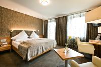 Łóżko lub łóżka w pokoju w obiekcie Stadthotel Goldenes Schiff