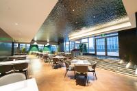 Et opholdsområde på 青岛若七酒店 Luxseven Hotel