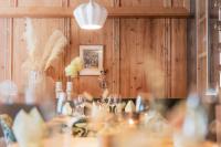 a table in a room with wooden walls at Försterhaus & Haus Andrea in Mayrhofen
