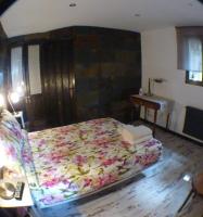 Posteľ alebo postele v izbe v ubytovaní Green Peaks B&B Country House Alojamiento Rural