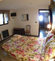 Posteľ alebo postele v izbe v ubytovaní Green Peaks B&B Country House Alojamiento Rural