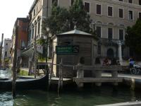 a gondola parked next to a small building on a canal at Guesthouse Ca&#39; San Marcuola 1 in Venice
