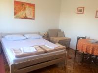 Postel nebo postele na pokoji v ubytování Apartments Radulović