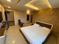 Ένα ή περισσότερα κρεβάτια σε δωμάτιο στο Hotel Aurelia Heights