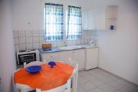 Kuchyňa alebo kuchynka v ubytovaní Litsa Mare Apartments