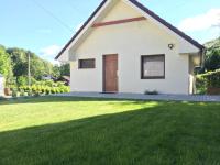 A garden outside Grand Spa Holiday Home