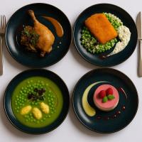 un grupo de platos de comida sobre una mesa en Luxury Hotel Siófok, en Siófok
