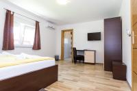 Posteľ alebo postele v izbe v ubytovaní Plitvice Palace