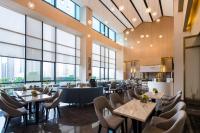 Et opholdsområde på Huizhou Faithland Atin Hotel