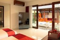 Theanna Villa and Spa Cangguにあるベッド