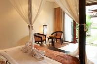 Theanna Villa and Spa Cangguにあるベッド