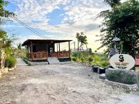 Zahrada ubytování Gamat Sunset Cottage and Resto