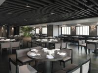 Un comedor con mesas y sillas en un restaurante. en Hotel Dùa, en Kaohsiung