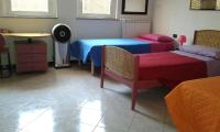 A bed or beds in a room at One M