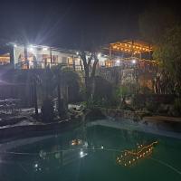 Πισίνα στο ή κοντά στο Nkisi Guesthouse