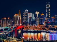 a night view of a city with a bridge at 重庆MAX范思酒店解放碑来福士店Chongqing MAX Van Hotel Jiefangbei Raffles in Chongqing