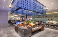 a buffet in a restaurant with a blue ceiling at Novotel Hangzhou Xintiandi in Hangzhou