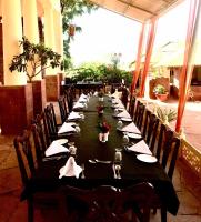 Εστιατόριο ή άλλο μέρος για φαγητό στο Reggies's Camel Camp,Osian