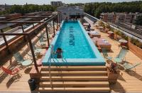 a swimming pool on the roof of a building at The Social Hub Toulouse in Toulouse