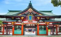 a temple with a red building with a roof at The Prince Gallery Tokyo Kioicho, a Luxury Collection Hotel in Tokyo