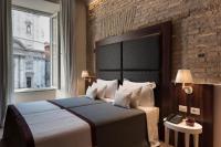 Posteľ alebo postele v izbe v ubytovaní Navona Luxury Guesthouse