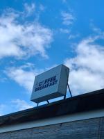 um sinal no topo de um edifício em Ciabel Hotel and Fitness Center em San Juan