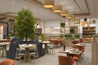 Four Points by Sheraton Kinshasa في Kinshasa: تصور لمطعم مع طاولات وكراسي