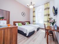 Postel nebo postele na pokoji v ubytování Apartamenty Bonerowska 5
