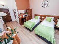 Postel nebo postele na pokoji v ubytování Apartamenty Bonerowska 5