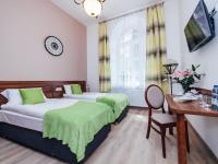 Postel nebo postele na pokoji v ubytování Apartamenty Bonerowska 5
