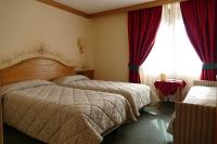 Hotel Garnì La Montanaraにあるベッド