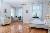 Łóżko lub łóżka w pokoju w obiekcie Pałac w Orli - pokoje, restauracja
