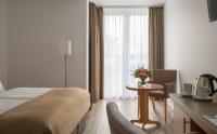 Postel nebo postele na pokoji v ubytování Hotel Chrisma
