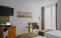 Postel nebo postele na pokoji v ubytování Hotel Chrisma
